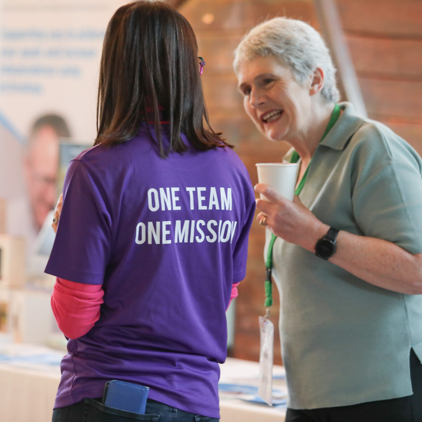 ABI Ireland staff members wearing One Team One Mission t shirt